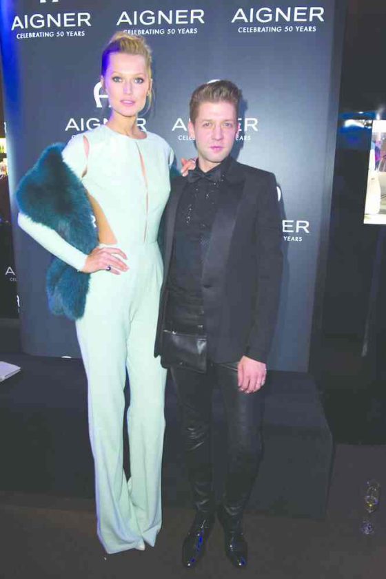 Toni Garrn (L) and chief designer Christian Beck