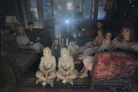 Seated on the floor: the twins (Thomas and Joseph Odwell), Fiona (Georgia Pemberton) and Hugh (Milo Parker), Left to right: Emma (Ella Purnell), Jake (Asa Butterfield), Horace (Hayden Keeler-Stone), Miss Peregrine (Eva Green), Enoch (Finlay Macmillan), Claire (Raffiella Chapman), Bronwyn (Pixie Davies) and Olive (Lauren McCrostie)